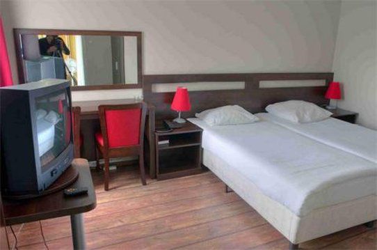 Hotel Damrak Άμστερνταμ Δωμάτιο φωτογραφία
